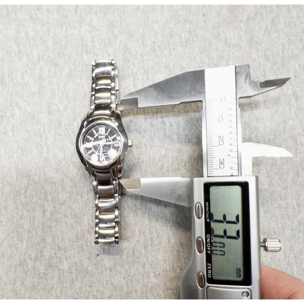 Citizen Women's Eco-Drive Silver Stainless Steel 25mm 10ATM Watch‎ E011 Movement